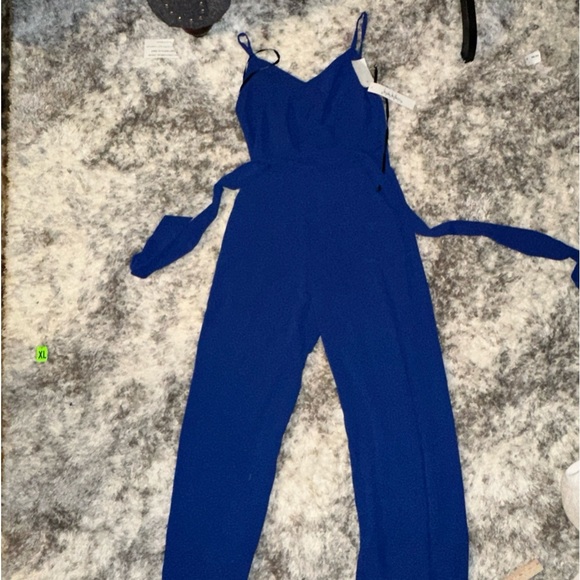 Nicole Miller Pants - Nichole Miller fully lined , spaghetti strap crepe belted jumpsuit NWT size 8